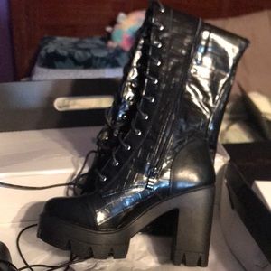 Snake print black thigh high boots